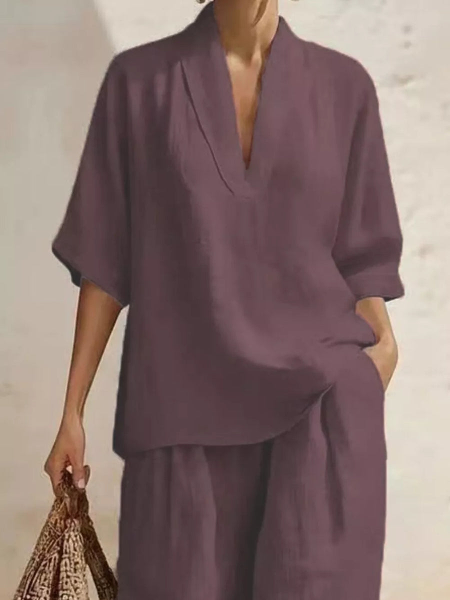 Mauve half-sleeve top with V-neck and wide-leg pants, casual women's outfit set.