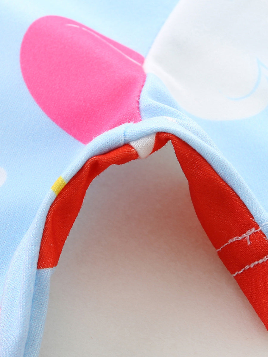 Baby dress with blue background, pink heart and balloon print, red trim detail.