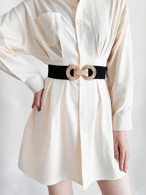 Black stretch belt with interlocking gold alloy buckle detail