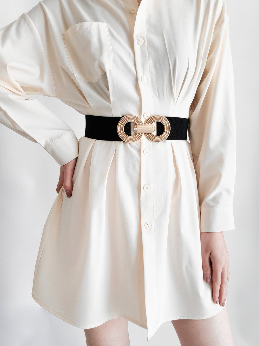 Black stretch belt with interlocking gold alloy buckle detail