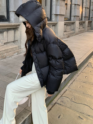 Polyester 100% Filling: Polyester Care instructions: Hand wash cold puffer jacket in White with relaxed silhouette
