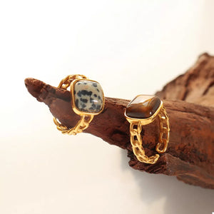 ring in gold with speckled and natural stone