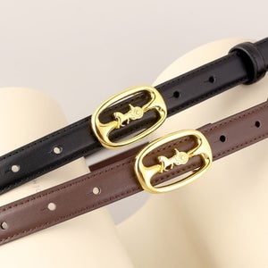 Cowhide leather belts in black and brown with gold horse carriage buckles.