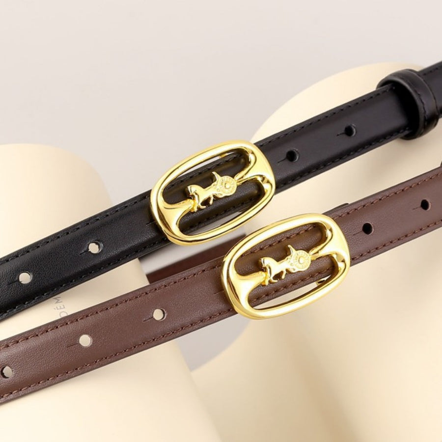 Cowhide leather belts in black and brown with gold horse carriage buckles.