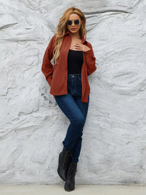 Classic corduroy button-up shirt in Amber, with a relaxed fit and collared neckline.