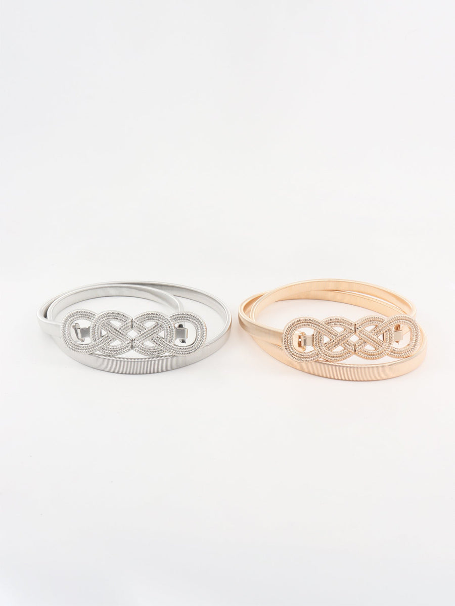 Gold and silver elastic belts with intertwined knot buckle detail
