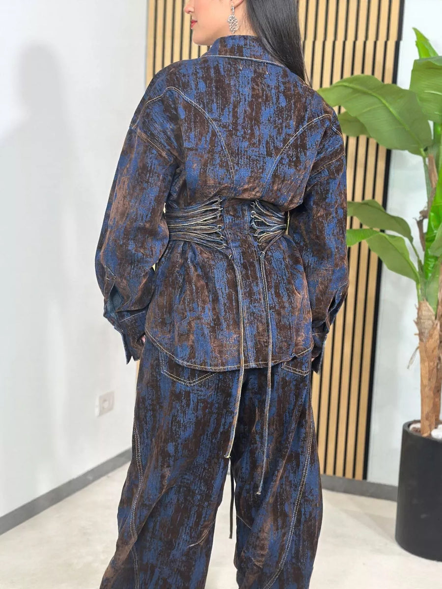 Denim jacket and pants set in dark blue with brown distressed print and lace-up waist detail