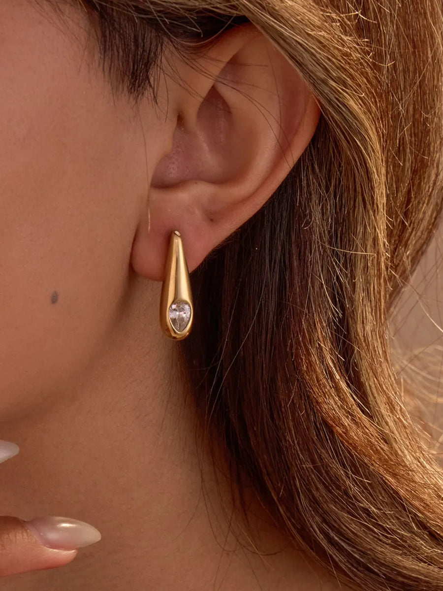 earrings in gold featuring gold-plated and teardrop fit