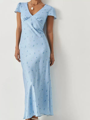 Blue floral print slip dress with short sleeves and a V-neckline.