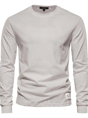 Light Gray crewneck long sleeve t-shirt with a small tag detail on the hem.