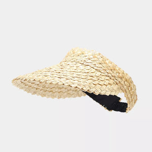 Tan hat featuring woven texture and geometric