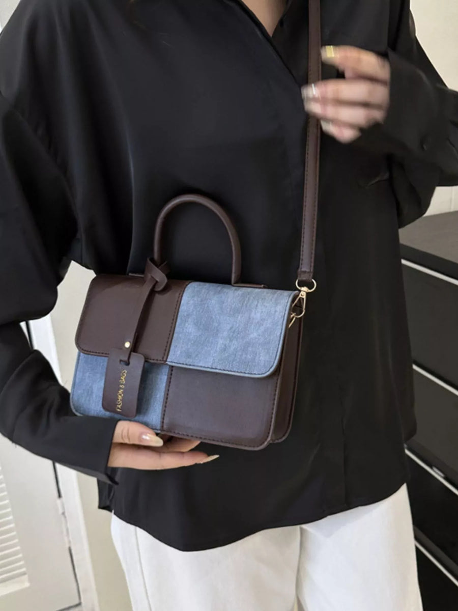 Chic two-tone PU leather crossbody bag with brown and light blue panels.