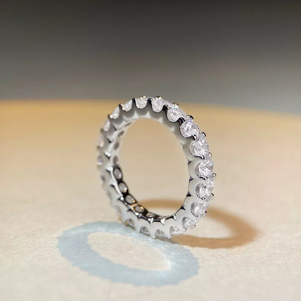 925 sterling silver, Moissanite Care instructions: Avoid wearing during exercise ring in clear with fitted silhouette