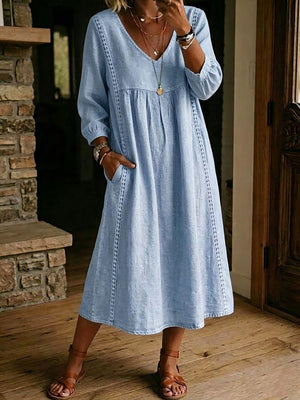 midi dress in light blue featuring pocketed and A-line fit