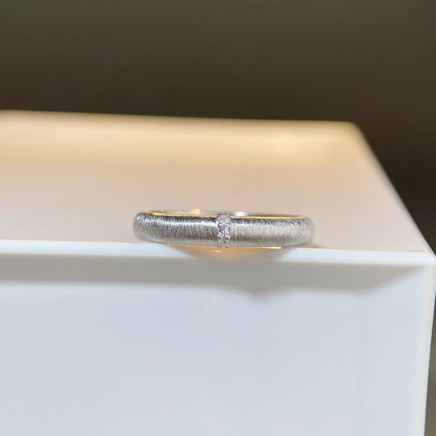 silver with ring with zircon accents