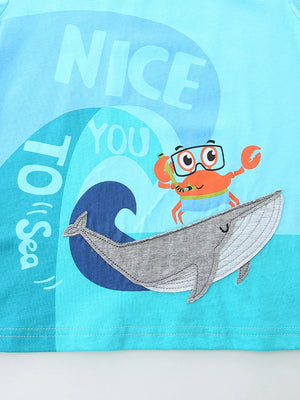 Baby blue cotton blend tee with whale and crab graphic, "Nice to Sea You" text.