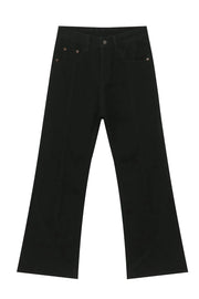Black flare jeans with panel seams and a wide leg