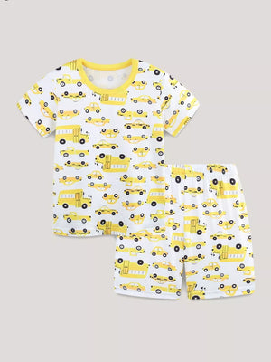 Toddler pajama set with yellow cartoon cars print on white, featuring bright yellow trim.