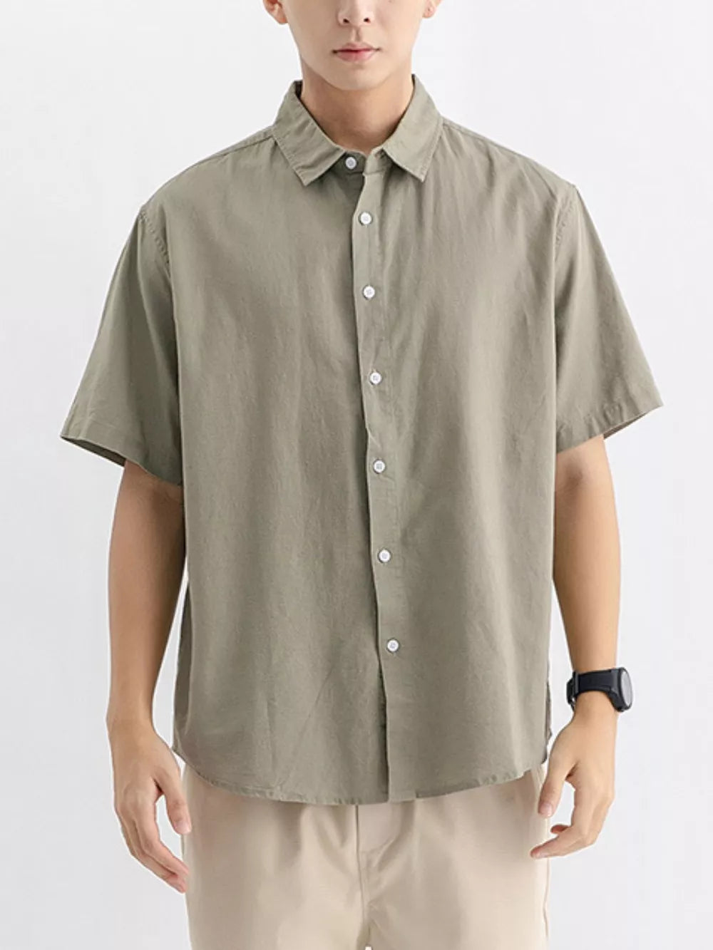 Men's short sleeve button-up shirt in Army Green cotton, classic casual style.