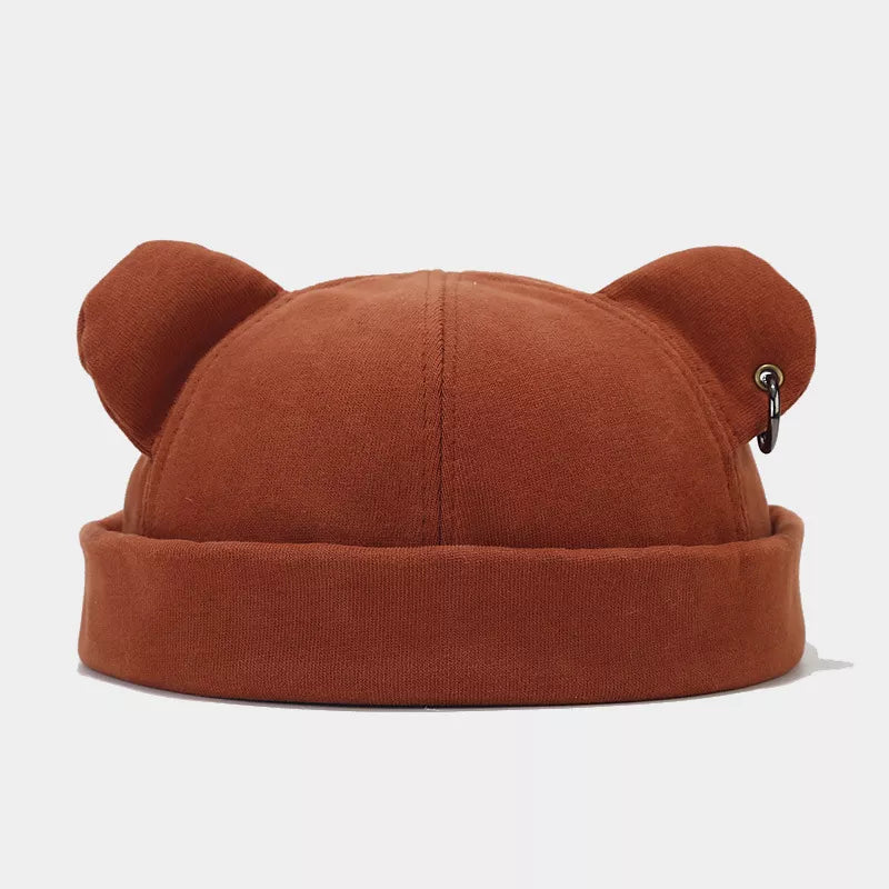 hat in rust featuring bear ears and fitted fit