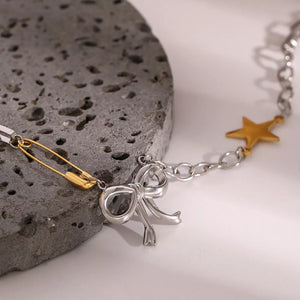 18K Gold-Plated, Stainless Steel Care instructions: Avoid wearing during exercis necklace in gold with layered silhouette
