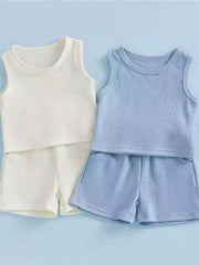 Soft ribbed baby tank and shorts set in blue and white breathable cotton.