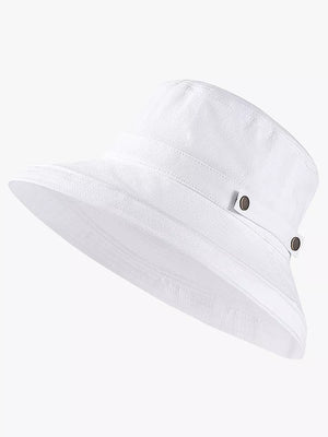 White cotton bucket hat with wide brim and brass hardware detail