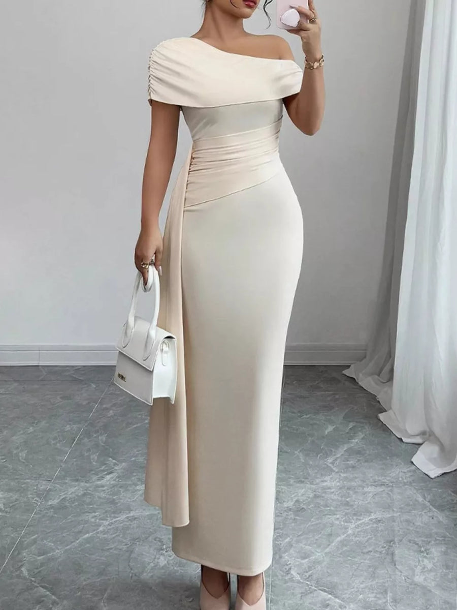 Chic asymmetrical ruched maxi dress in apricot with off-the-shoulder neckline and draped detail.