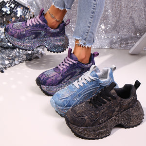 Rhinestone high-heel platform sneakers in black, blue, and purple with chunky soles.