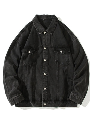 Black 100% cotton denim trucker jacket with button-up front and chest pockets.