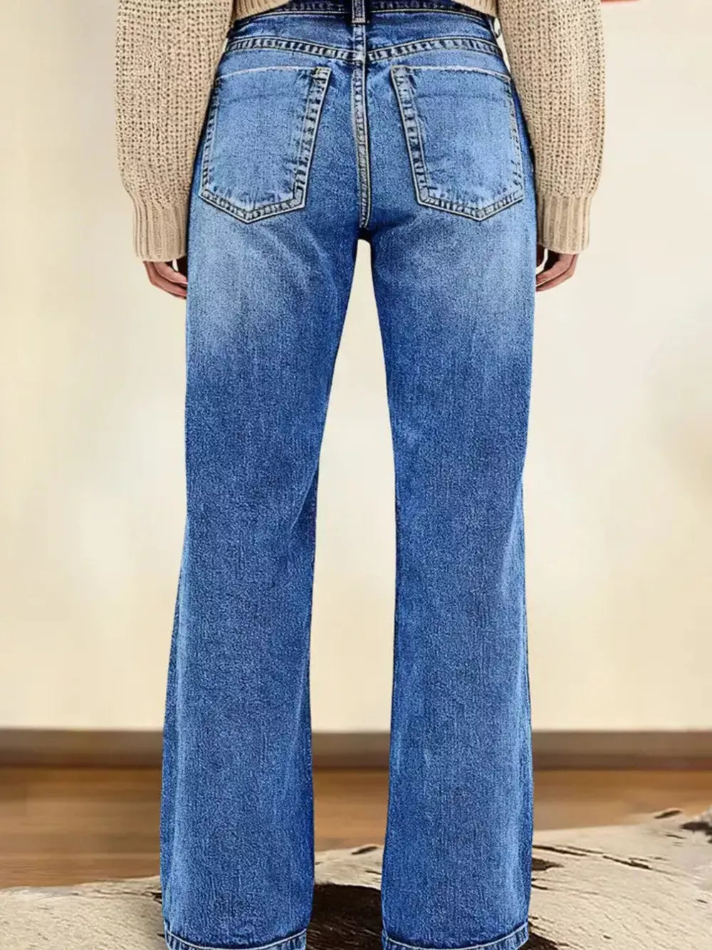 Timeless Vintage Wash Straight Leg Jeans in medium light blue denim with a buttoned fly.