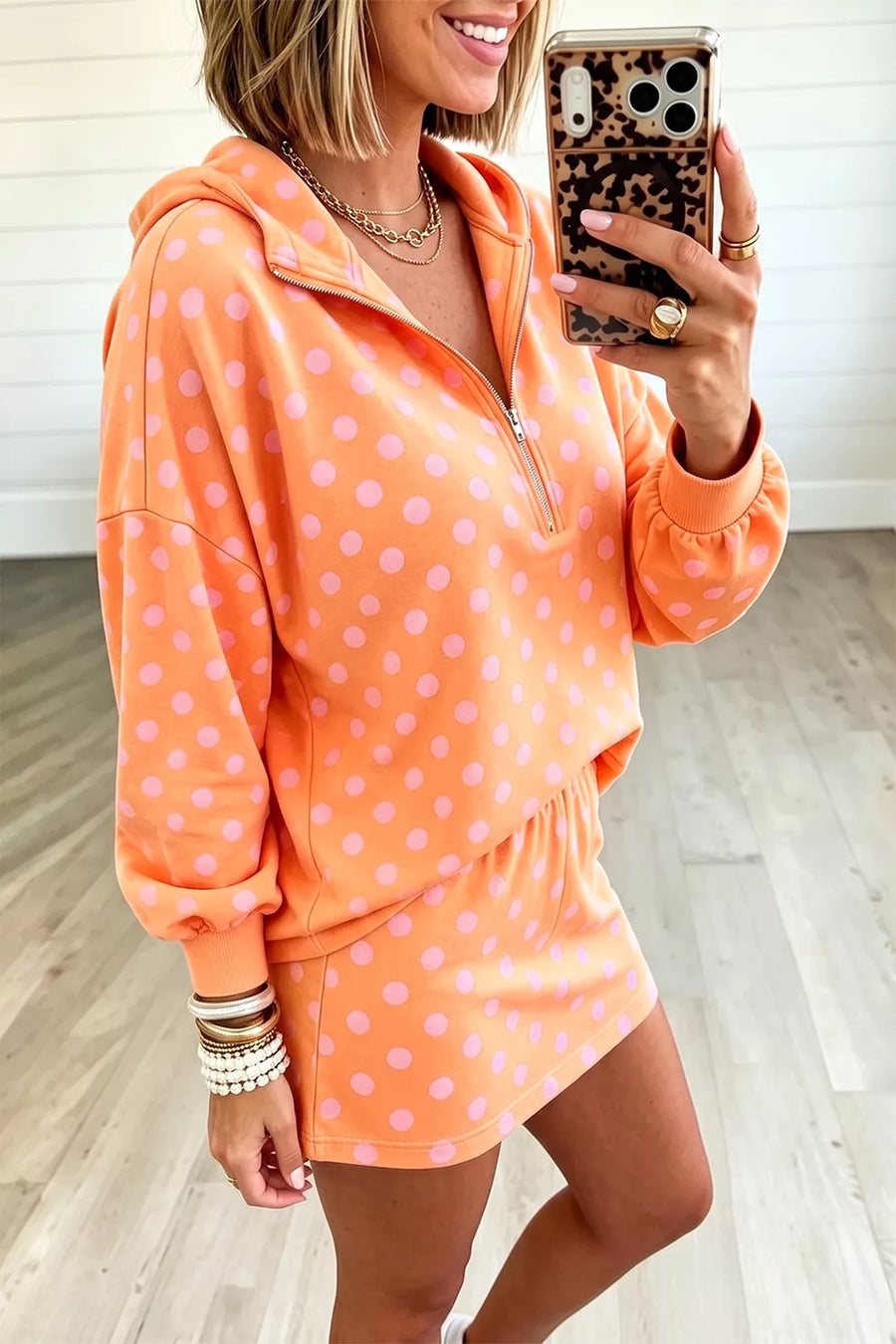 95% polyester, 5% elastane Care instructions: Machine wash cold two-piece set in Tangerine with relaxed silhouette