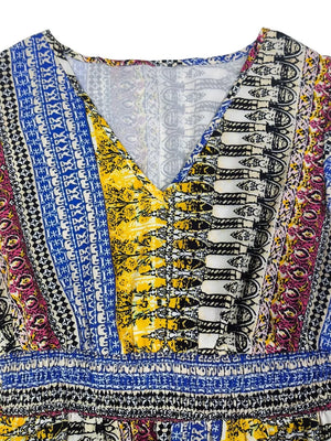Bohemian maxi dress with V-neck, ruffle sleeves, and colorful tribal print.