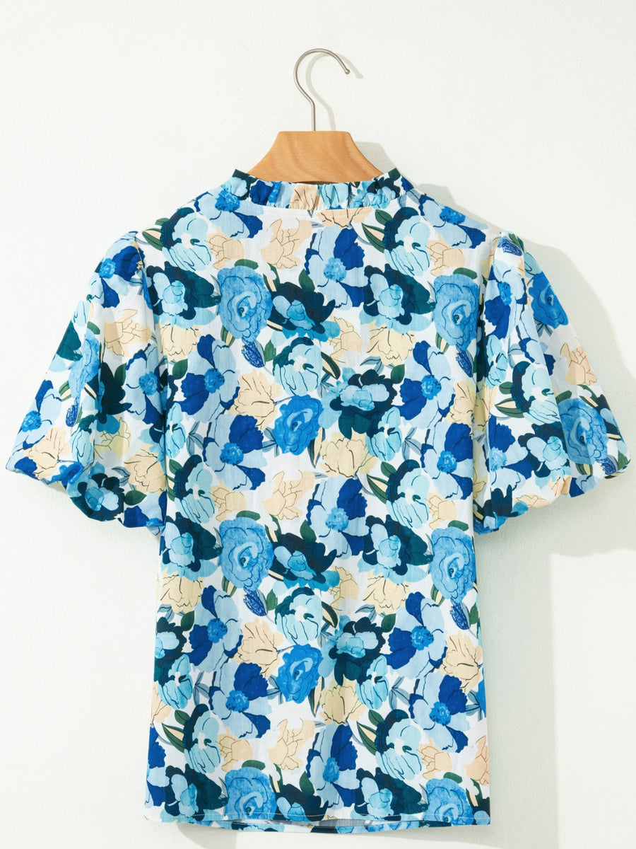 Vibrant floral print cotton blouse with puff sleeves and mock neck