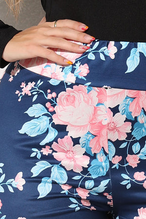 Floral Bloom Sculpt Legging in Peacock Blue with a pink and blue floral print.