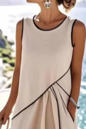 Beige maxi dress with black contrast piping and pleated detail