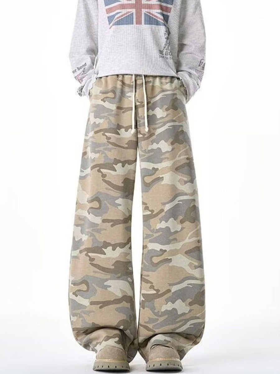 olive green wide-leg pants featuring drawstring waist and camo