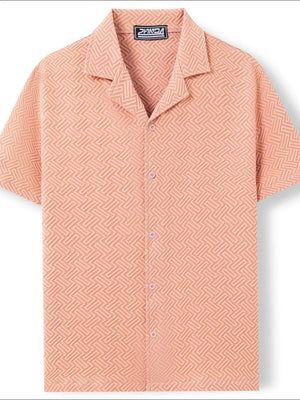 Textured resort collar shirt in pale blush with geometric pattern and button front.