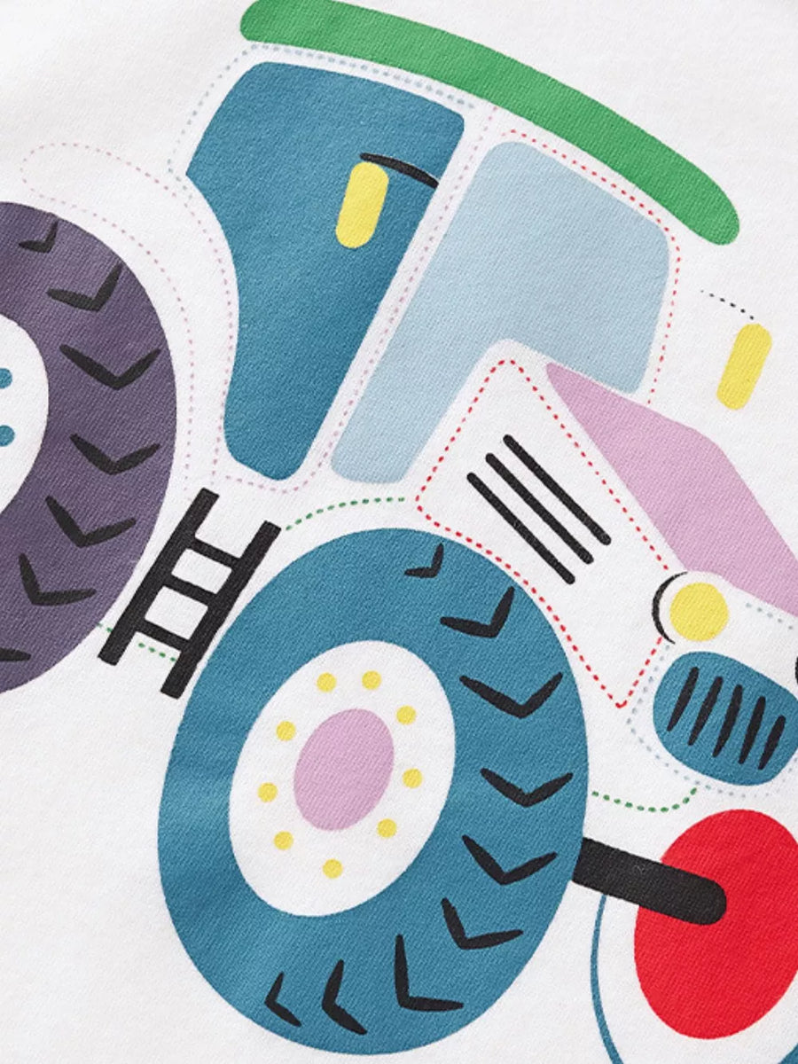 White t-shirt with a colorful tractor graphic featuring blue, green, pink, and red details.