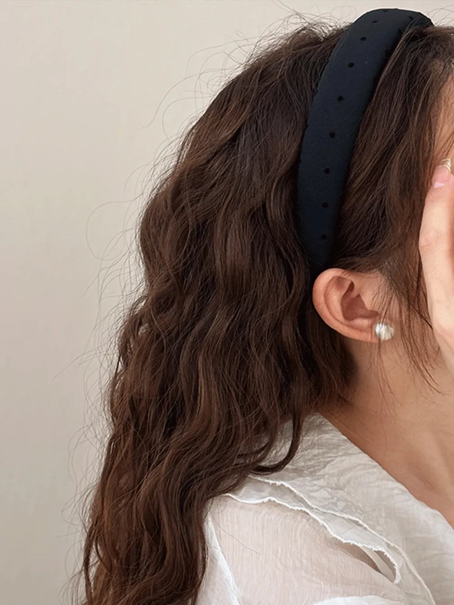 Black polka dot padded headband with handmade label detail