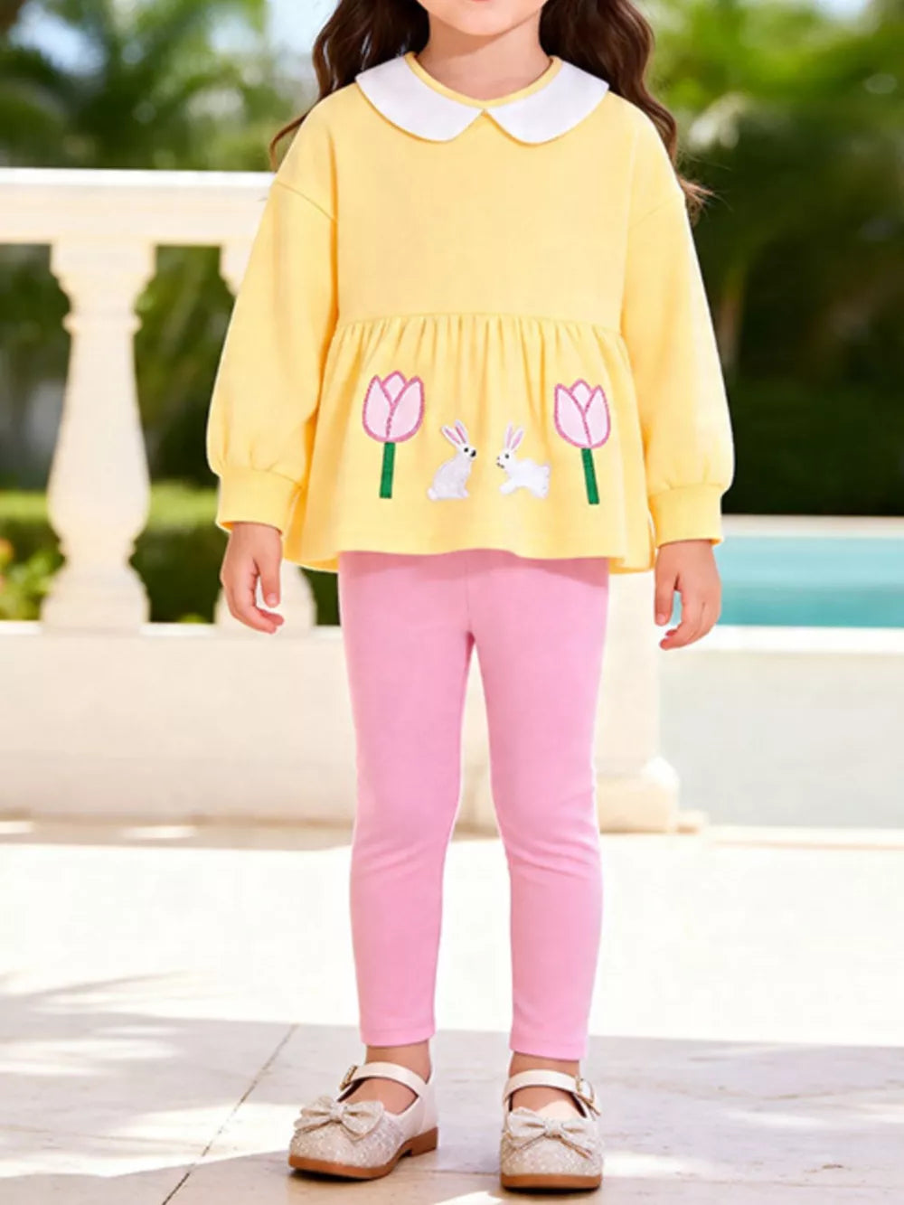 sweatshirt in light yellow featuring tiered and A-line fit