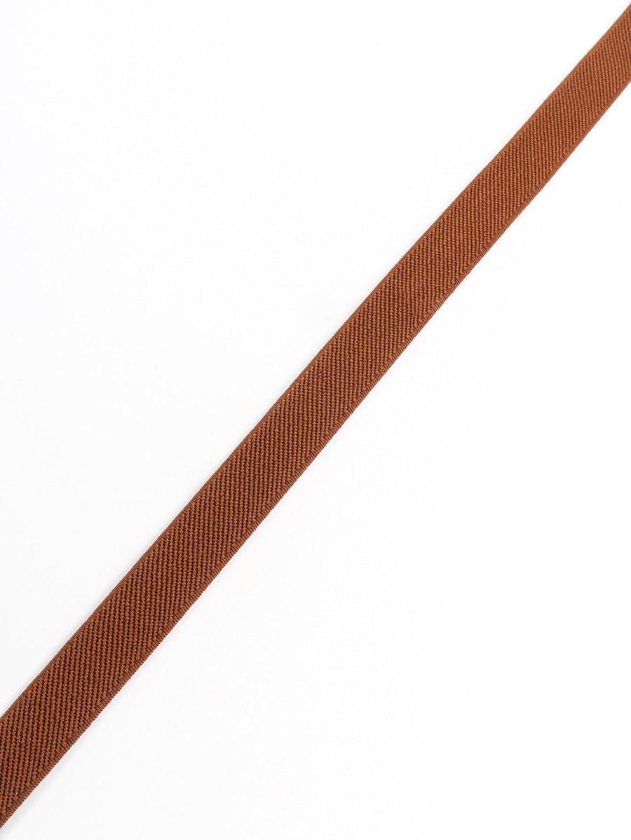 Caramel elasticated belt with textured weave and leather detail.