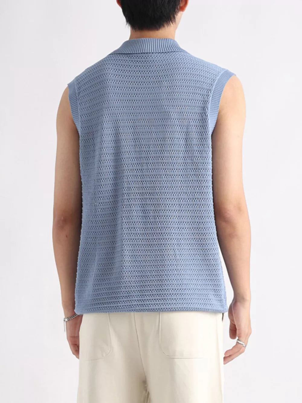 Blue knit polo collar tank top with open weave detail.