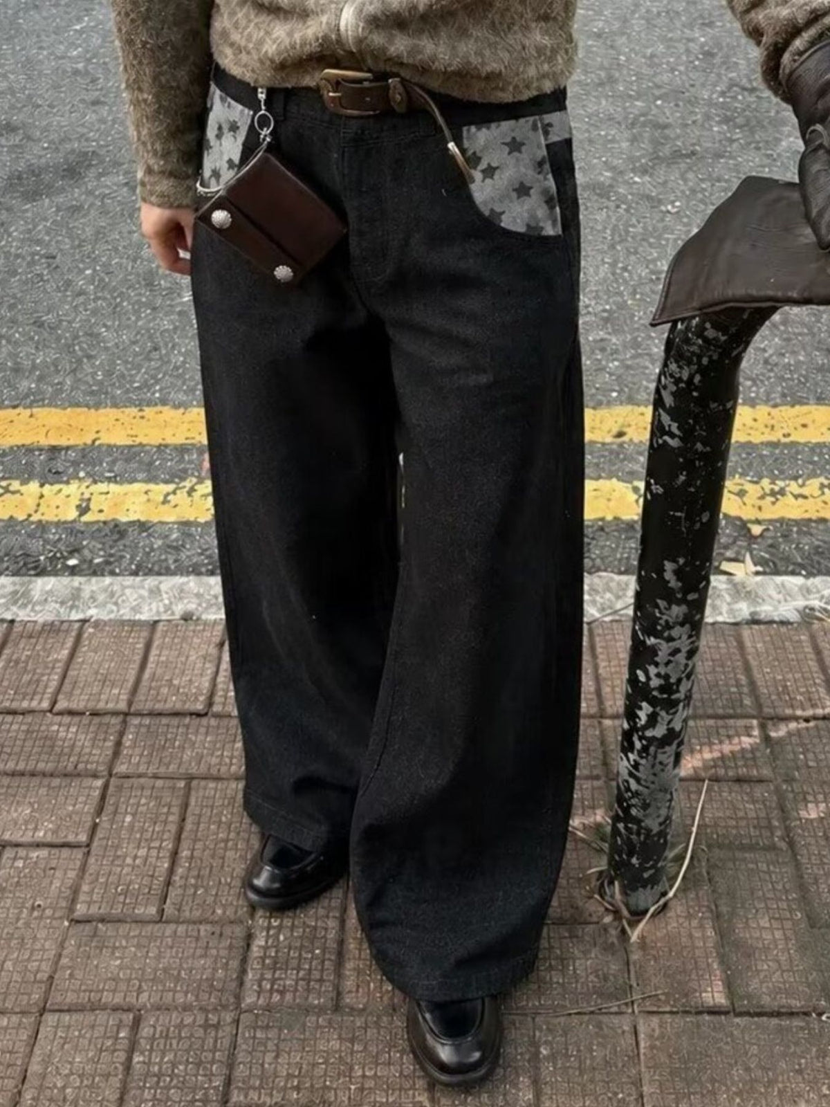 jeans in black featuring pocketed and wide-leg fit