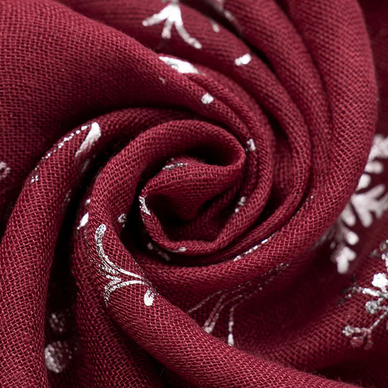 Burgundy scarf with metallic Christmas print and woven texture