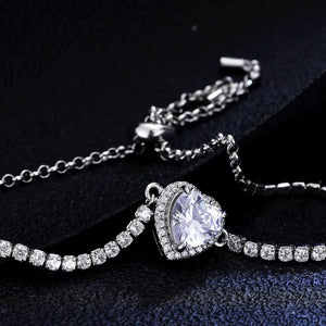 925 sterling silver,Moissanite Carat weight: 2ct Care instructions: Avoid wearin bracelet in clear with fitted silhouette