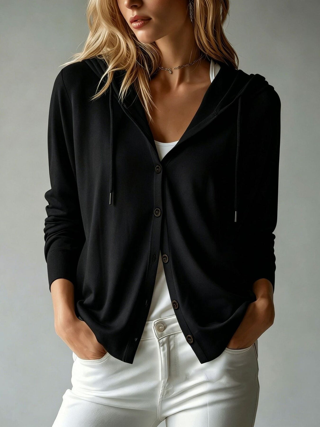 White cardigan with hip-length and button-front