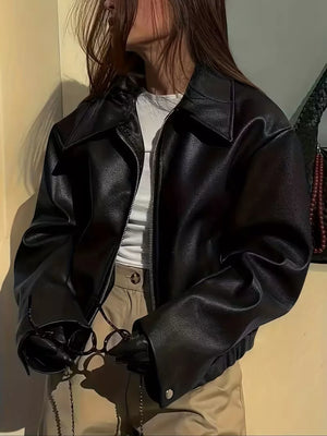 100% polyester Care instructions: Machine wash cold moto jacket in Black with oversized silhouette