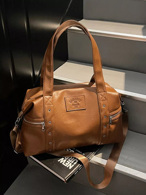 Chic brown pu leather shoulder bag with adjustable strap and silver hardware details