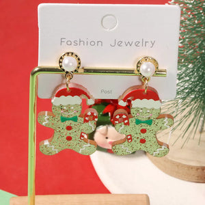 red earrings featuring dangle and novelty
